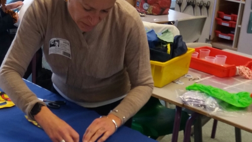 Teacher demonstration at a textile workshop