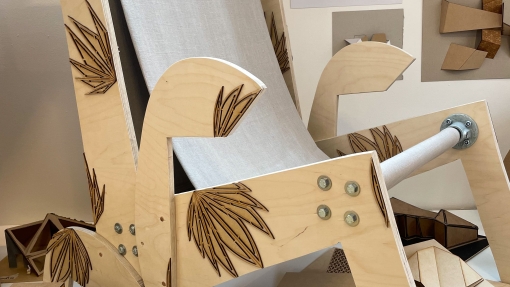 A large char made out of wood. 