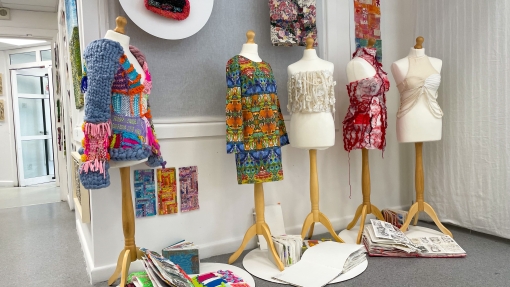 Three outfits made out of yarn and wool. 