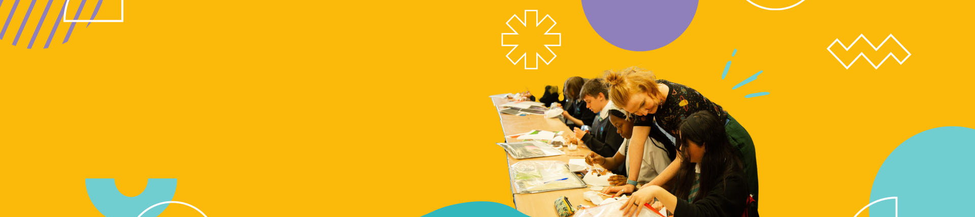 A yellow banner with an image of pupils sat at a long desk and a teacher is leaning over one pupil, pointing at their work on the table. 