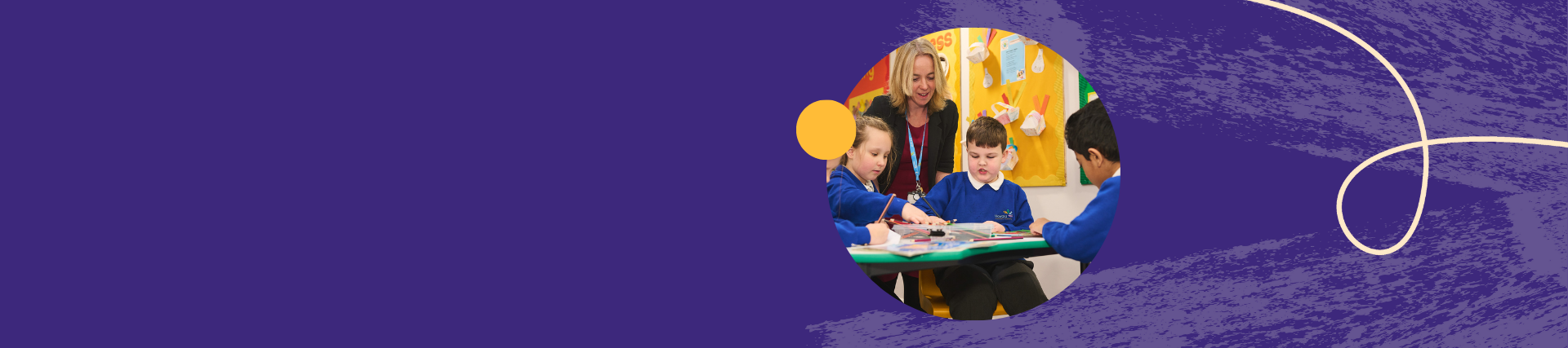 A purple banner with an image of a teacher and children at a classroom table. The children are looking down at their work.