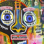 Vibrant painting of a skull with the phrase 'The body and the mind' written on it
