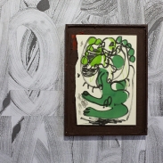 Art work in frame on a painted wall